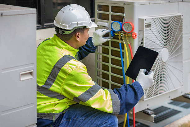 Professional Air Duct Cleaning technician working in Holyoke, MA